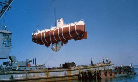 Historic bathyscaphe submersible descending into the deep ocean